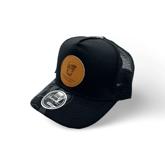 Gorra Human Unisex  Trucker / Negro sublimada